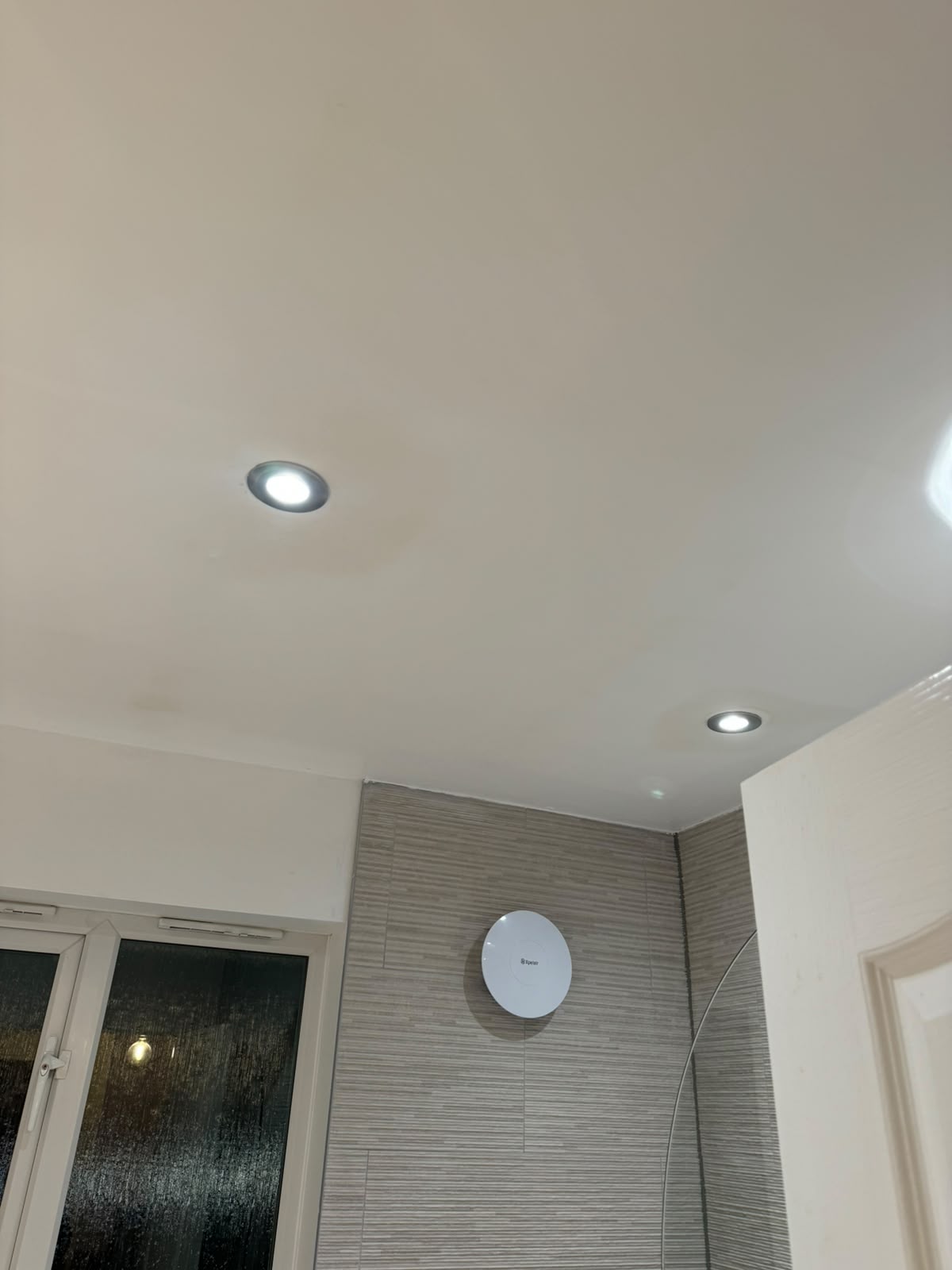 Kitchen and bathroom electrical installation by Electrust — sockets, downlights and extractors